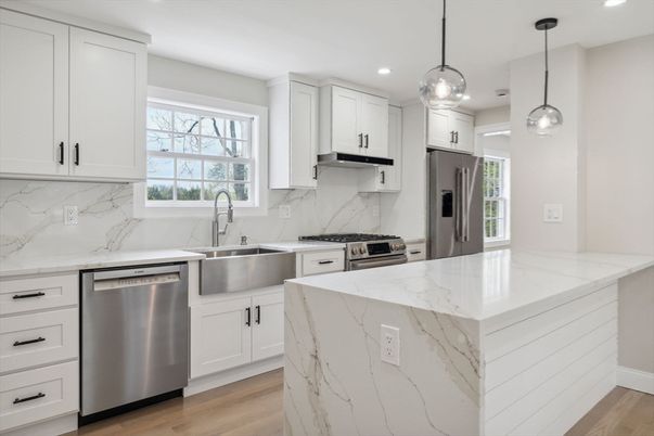 Interior, Kitchen, Marble Walls, Pendant Lights, Recessed Lighting, Stainless Steel Appliances, Wood Texture Flooring