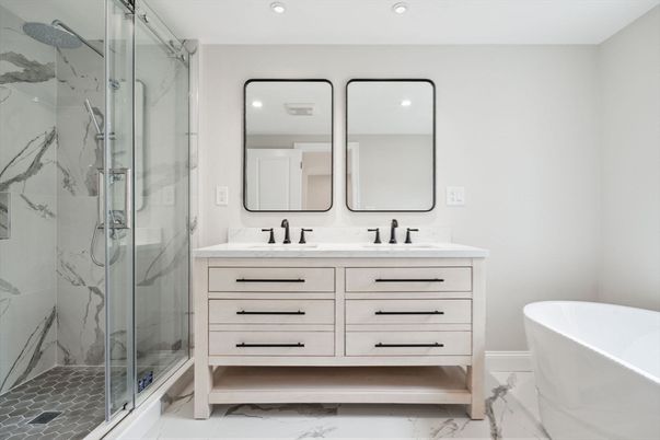 Bathroom, Dual Sink Vanities, Free Standing Baths, Glass Shower, Interior, Marble, Marble Walls, Recessed Lighting