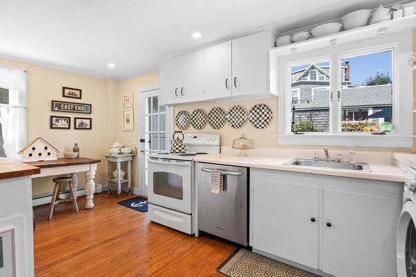 Interior, Kitchen, Recessed Lighting, Washer, Wood Texture Flooring