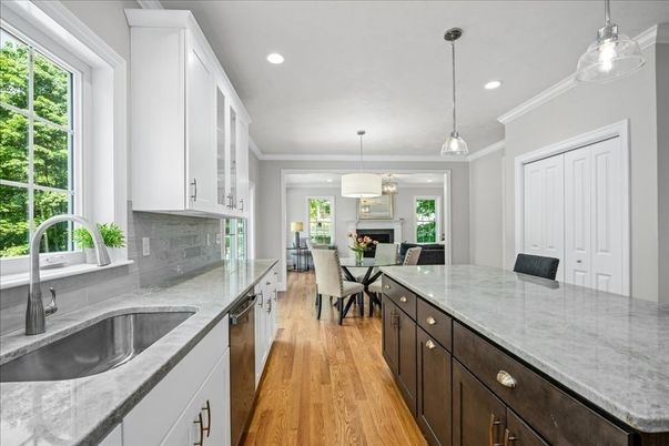 Dining room, Fireplace, Interior, Kitchen, Pendant Lights, Recessed Lighting, Wood Texture Flooring