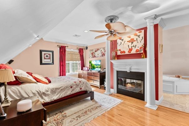 Bedroom, Fireplace, Interior, Recessed Lighting, Wood Texture Flooring