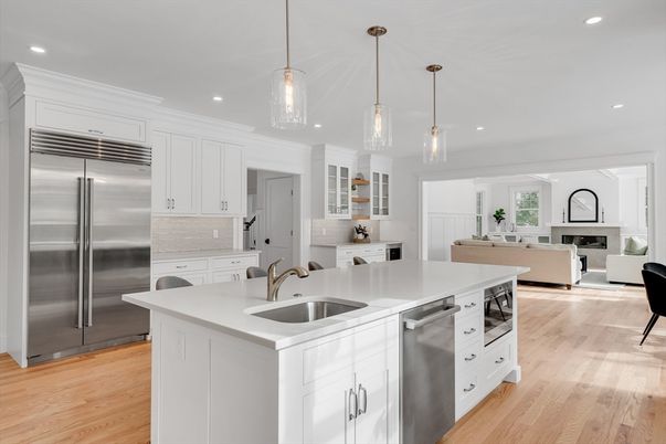 Fireplace, Interior, Kitchen, Living room, Pendant Lights, Recessed Lighting, Stainless Steel Appliances, Wood Texture Flooring