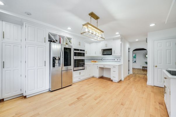 Interior, Kitchen, Pendant Lights, Recessed Lighting, Stainless Steel Appliances, Wood Texture Flooring