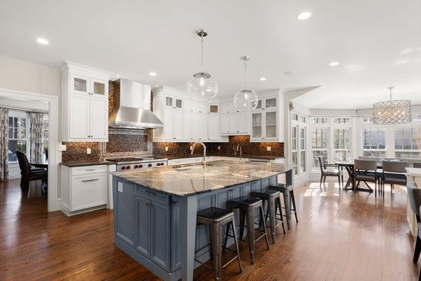 Chandelier, Dining room, Interior, Kitchen, Pendant Lights, Recessed Lighting, Stainless Steel Appliances, Wood Texture Flooring