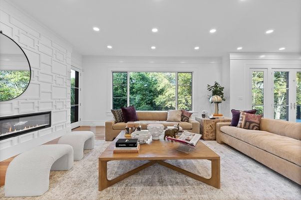 Fireplace, Interior, Living room, Recessed Lighting, Stone Walls, Wood Texture Flooring