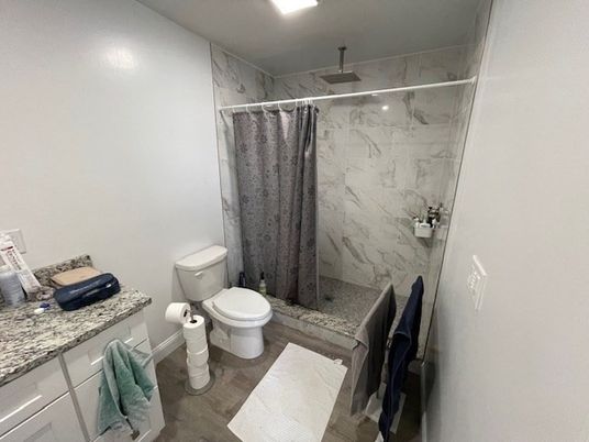 Bathroom, Interior, Marble Walls, Recessed Lighting, Wood Texture Flooring