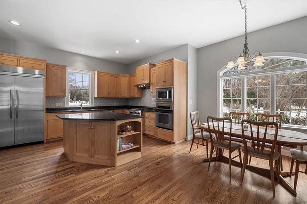 Chandelier, Dining room, Interior, Kitchen, Recessed Lighting, Stainless Steel Appliances, Wood Texture Flooring
