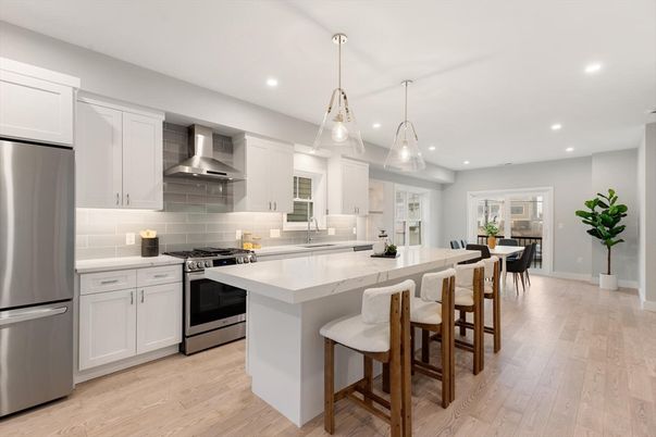 Dining room, Interior, Kitchen, Pendant Lights, Recessed Lighting, Stainless Steel Appliances, Wood Texture Flooring