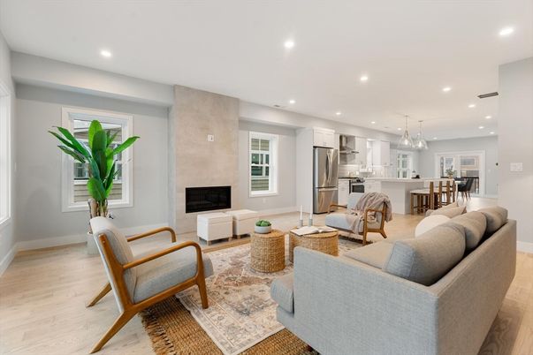 Chandelier, Dining room, Fireplace, Interior, Kitchen, Living room, Pendant Lights, Recessed Lighting, Stainless Steel Appliances, Wood Texture Flooring