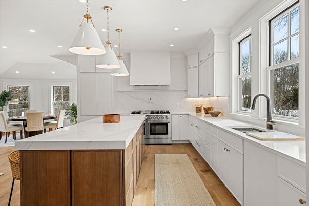 Dining room, Interior, Kitchen, Marble Walls, Pendant Lights, Recessed Lighting, Stainless Steel Appliances, Wood Texture Flooring