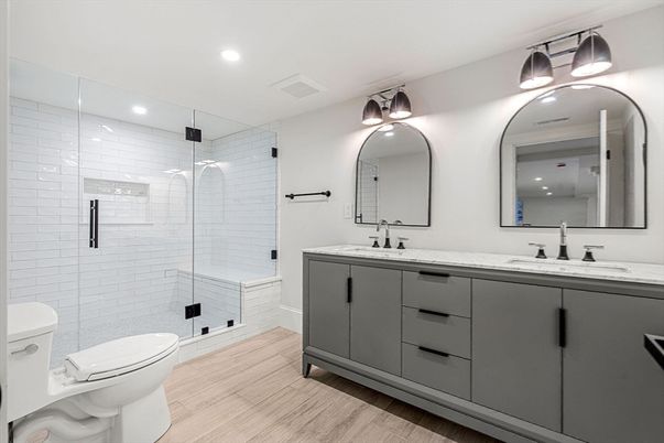 Bathroom, Dual Sink Vanities, Glass Shower, Interior, Recessed Lighting, Wood Texture Flooring