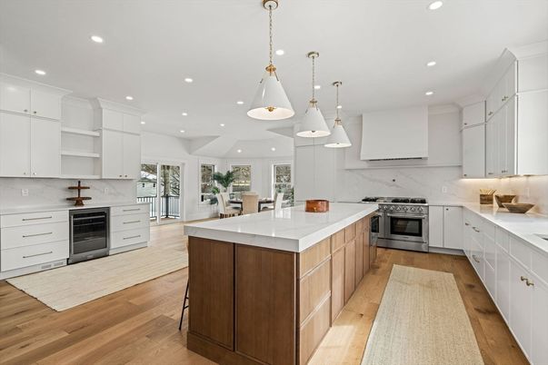 Dining room, Interior, Kitchen, Marble Walls, Pendant Lights, Recessed Lighting, Stainless Steel Appliances, Wood Texture Flooring