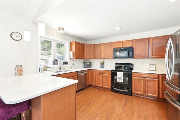 Dining room, Interior, Kitchen, Living room, Pendant Lights, Recessed Lighting, Stainless Steel Appliances, Wood Texture Flooring