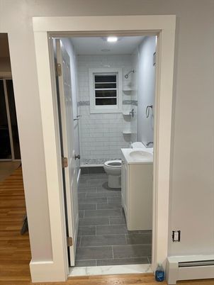 Bathroom, Dual Sink Vanities, Glass Shower, Interior, Recessed Lighting, Wood Texture Flooring