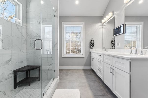 Bathroom, Dual Sink Vanities, Glass Shower, Interior, Marble Walls, Recessed Lighting