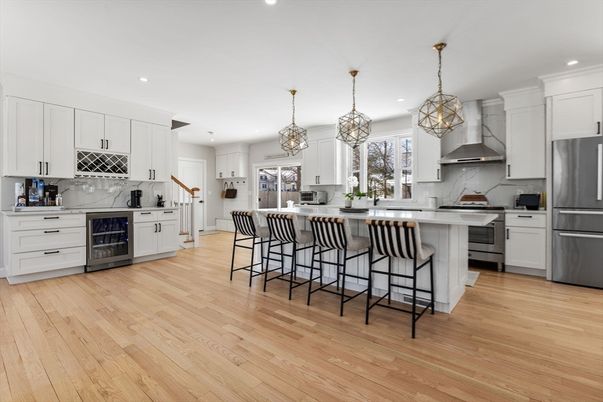 Interior, Kitchen, Marble Walls, Pendant Lights, Recessed Lighting, Stainless Steel Appliances, Wood Texture Flooring