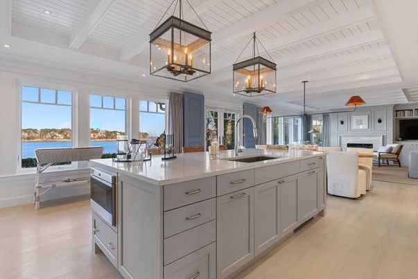 Fireplace, Interior, Kitchen, Living room, Pendant Lights, Recessed Lighting, Stainless Steel Appliances, Water, Wood Texture Flooring