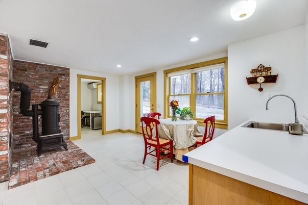 Dining room, Fireplace, Interior, Recessed Lighting, Stone Walls
