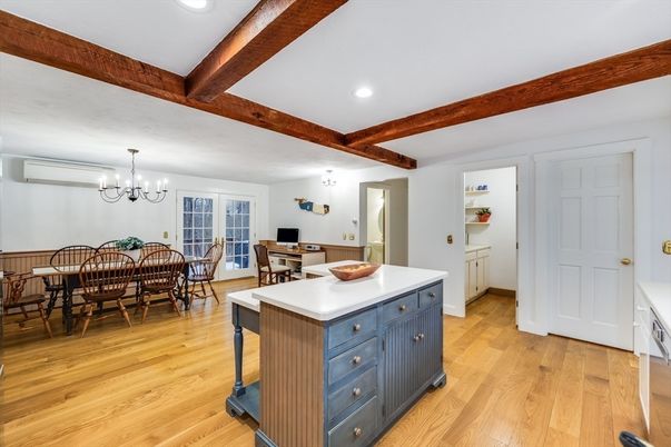 Chandelier, Dining room, Interior, Recessed Lighting, Wooden Beams, Wood Texture Flooring