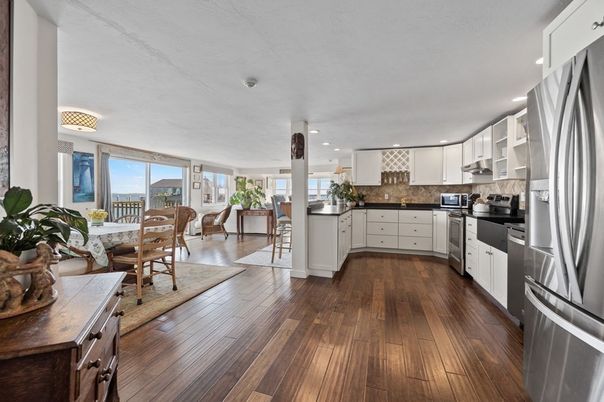 Dining room, Interior, Kitchen, Recessed Lighting, Stainless Steel Appliances, Wood Texture Flooring