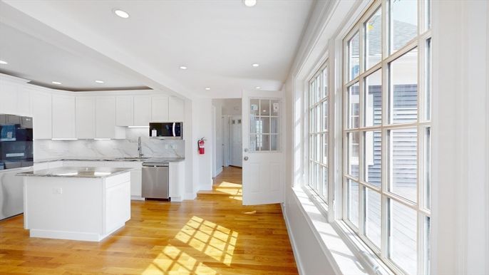 Interior, Kitchen, Marble Walls, Recessed Lighting, Stainless Steel Appliances, Wood Texture Flooring