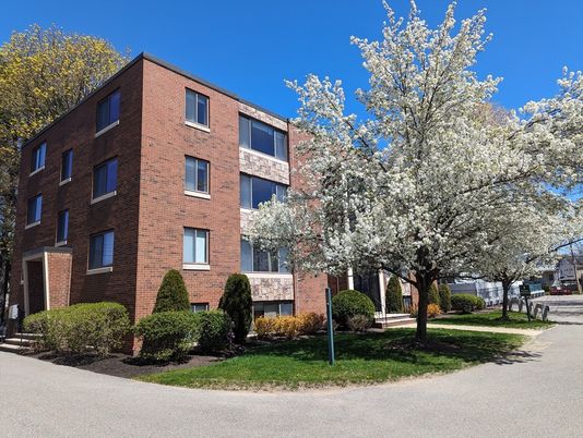 Exterior, Facade, Brick Facade, Condo Building