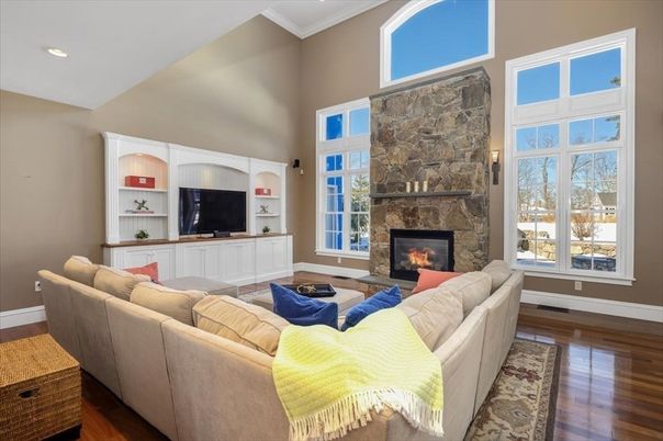 Fireplace, Interior, Living room, Recessed Lighting, Stone Walls, Wood Texture Flooring
