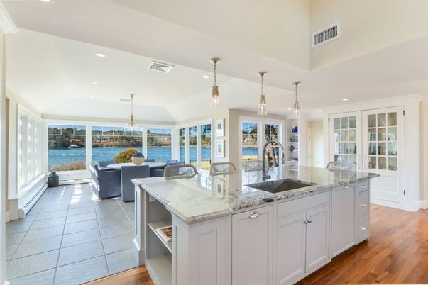 Chandelier, Dining room, Interior, Kitchen, Living room, Pendant Lights, Recessed Lighting, Water, Wood Texture Flooring