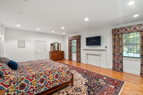 Bedroom, Fireplace, Interior, Recessed Lighting, Wood Texture Flooring