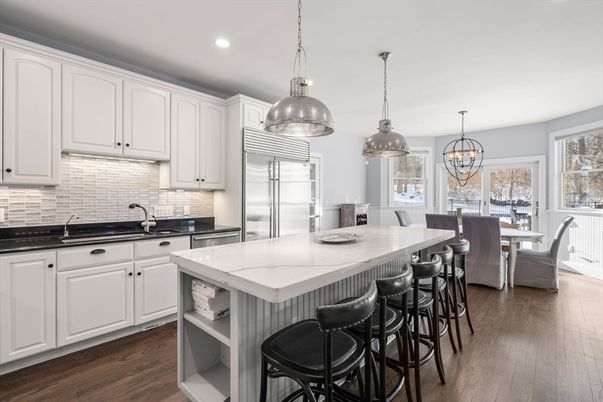 Chandelier, Dining room, Interior, Kitchen, Pendant Lights, Recessed Lighting, Stainless Steel Appliances, Wood Texture Flooring