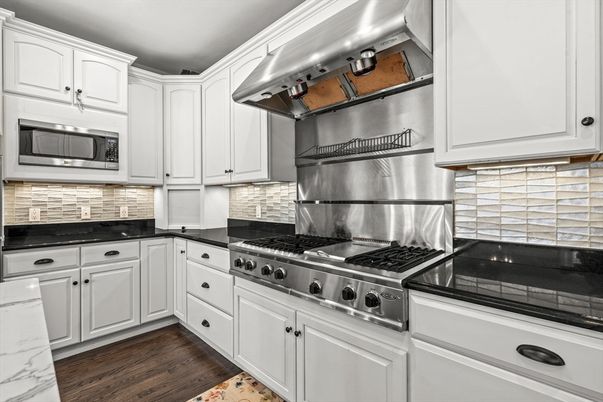 Interior, Kitchen, Stainless Steel Appliances, Tile Countertops, Wood Texture Flooring