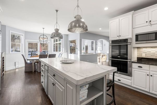 Chandelier, Dining room, Interior, Kitchen, Pendant Lights, Recessed Lighting, Stainless Steel Appliances, Wood Texture Flooring
