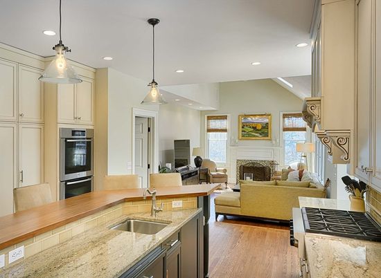 Fireplace, Interior, Kitchen, Living room, Pendant Lights, Recessed Lighting, Stainless Steel Appliances, Wood Texture Flooring