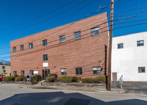 Exterior, Facade, Brick Facade, Condo Building