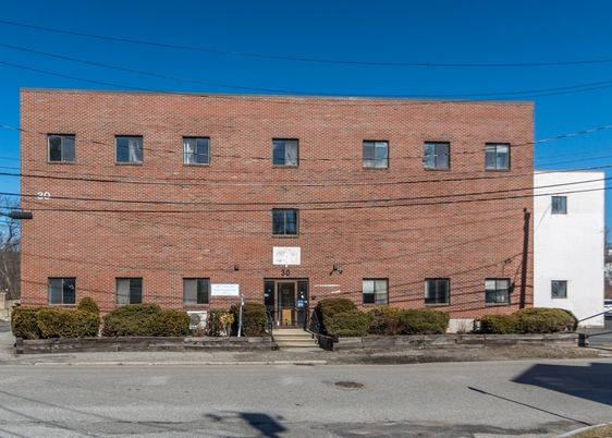 Exterior, Facade, Brick Facade, Condo Building