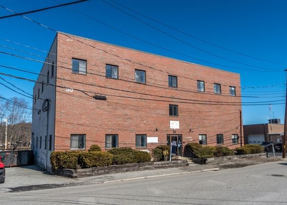Exterior, Facade, Brick Facade, Condo Building