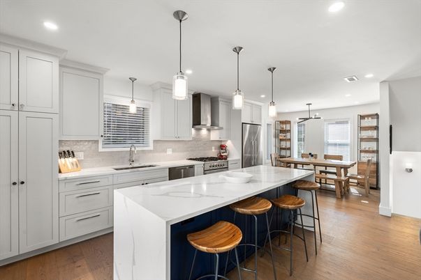 Dining room, Interior, Kitchen, Pendant Lights, Recessed Lighting, Stainless Steel Appliances, Wood Texture Flooring