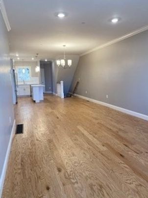 Chandelier, Empty room, Interior, Kitchen, Pendant Lights, Recessed Lighting, Wood Texture Flooring
