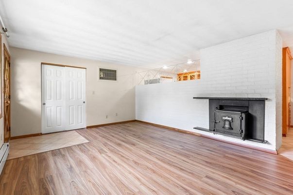 Empty room, Fireplace, Interior, Stone Walls, Wood Texture Flooring
