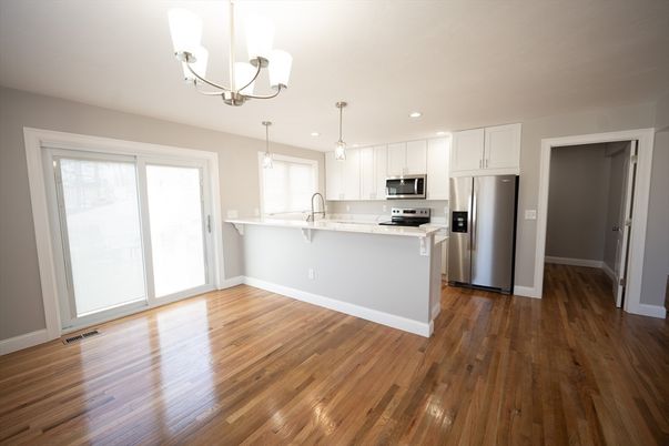 Chandelier, Interior, Kitchen, Pendant Lights, Recessed Lighting, Stainless Steel Appliances, Wood Texture Flooring