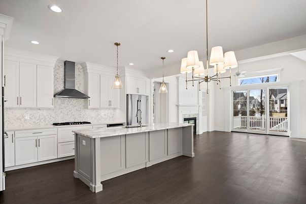 Chandelier, Interior, Kitchen, Marble Walls, Pendant Lights, Recessed Lighting, Stainless Steel Appliances, Wood Texture Flooring