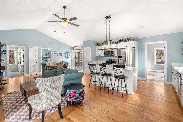 Chandelier, Dining room, Interior, Kitchen, Pendant Lights, Stainless Steel Appliances, Wood Texture Flooring