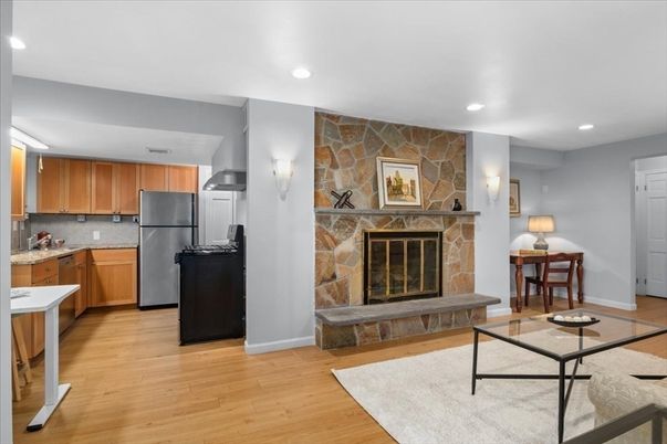 Fireplace, Interior, Kitchen, Recessed Lighting, Stone Walls, Wood Texture Flooring