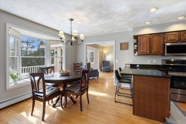 Chandelier, Dining room, Interior, Kitchen, Recessed Lighting, Stainless Steel Appliances, Wood Texture Flooring