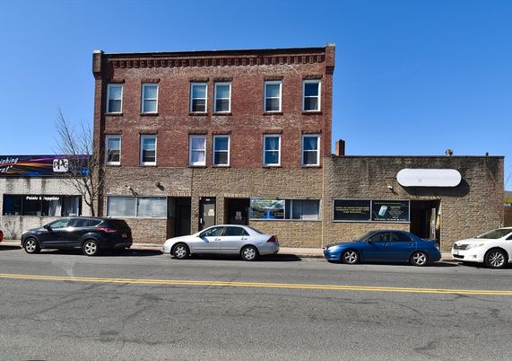 Exterior, Facade, Brick Facade, Condo Building