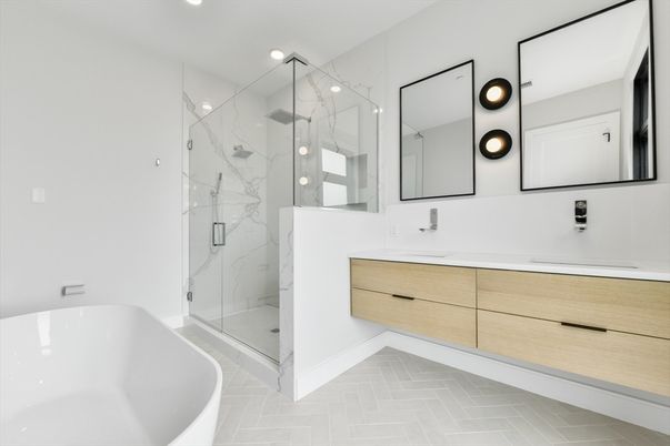 Bathroom, Dual Sink Vanities, Free Standing Baths, Glass Shower, Interior, Marble Walls, Recessed Lighting