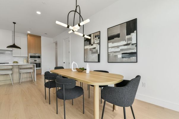 Dining room, Interior, Kitchen, Pendant Lights, Recessed Lighting, Stainless Steel Appliances, Wood Texture Flooring