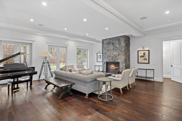 Fireplace, Interior, Living room, Piano, Recessed Lighting, Stone Walls, Wood Texture Flooring