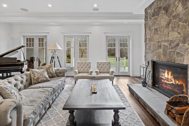Fireplace, Interior, Living room, Piano, Recessed Lighting, Stone Walls, Wood Texture Flooring