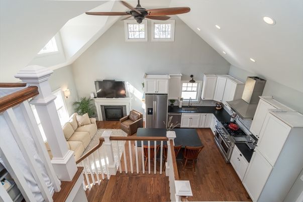 Fireplace, Interior, Kitchen, Living room, Recessed Lighting, Stainless Steel Appliances, Wood Texture Flooring